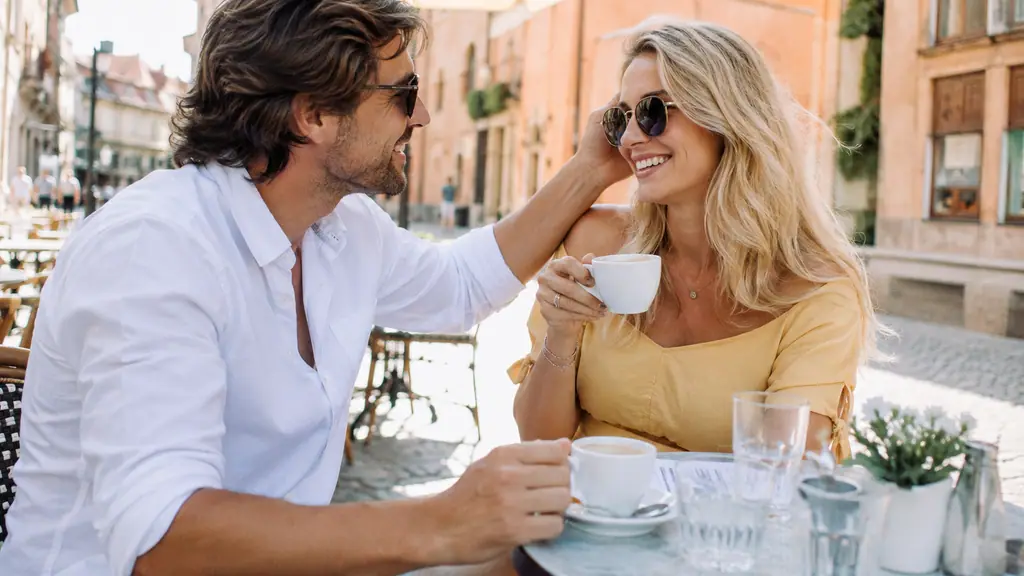 A couple sharing a moment at a café